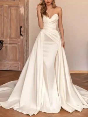 Vestido de novia con sobre falda